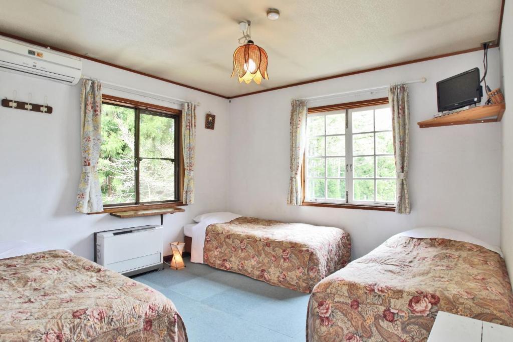 ペンション ちゃうちゃう Bed and Breakfast Hakuba Værelse billede